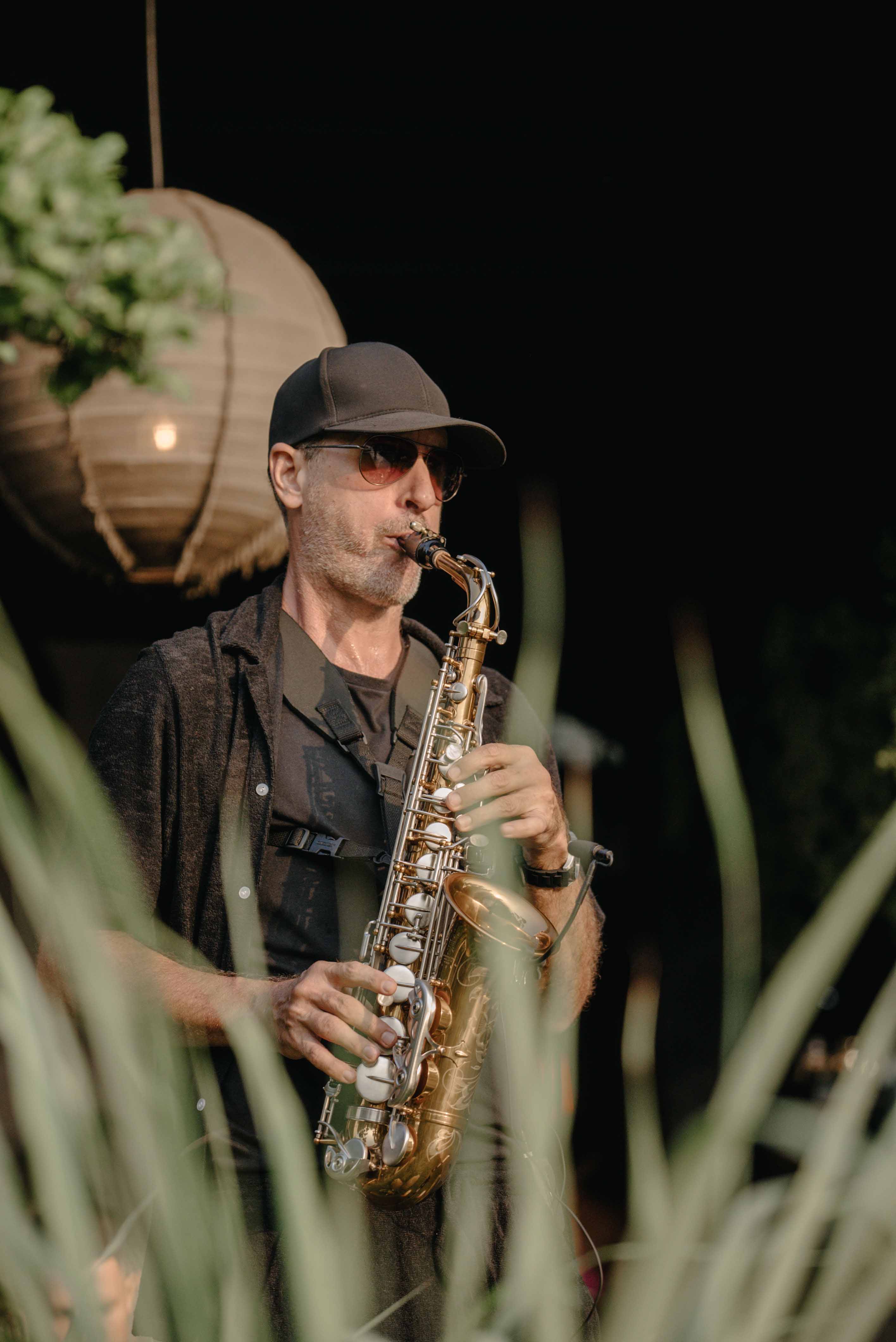 Live saxophone performance during Wrong Gym Bali’s Wrong Night event, blending fitness culture with vibrant evening entertainment.